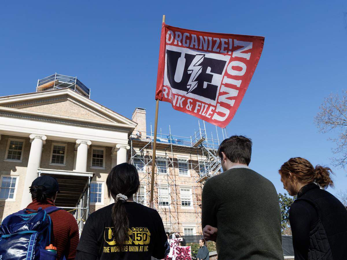 People gather near South Building at UNC-Chapel Hill on Wednesday, Jan. 7, 2026, for a protest held in response to the potential closure of six university study centers that focus on international history, politics and cultures.