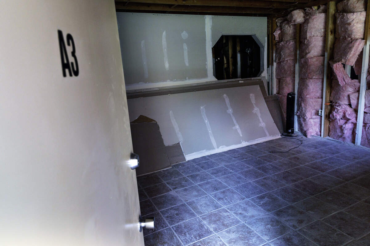 Doors to some of the vacant units at the Camelot Village housing complex remained open almost a year after flooding during Tropical Storm Chantal on Thursday, July 2, 2026, in Chapel Hill.