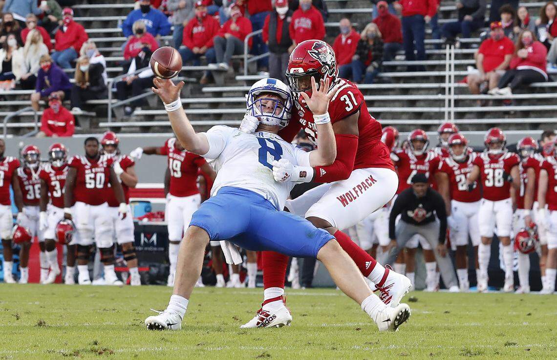 On fourth and goal from the one, N.C. State linebacker Vi Jones (31) chases down Duke quarterback Chase Brice (8) to cause an incompletion and turnover on downs during the second half of N.C. State’s 31-20 victory over Duke at Carter-Finley Stadium in Raleigh, N.C., Saturday, Oct. 17, 2020.