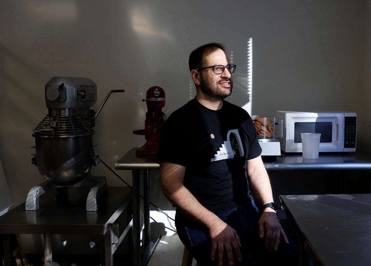 Fadi Ghanayem, co-owner of La Recette Patisserie, is photographed in the bakery on Tuesday, Dec. 19, 2023, in Durham, N.C.