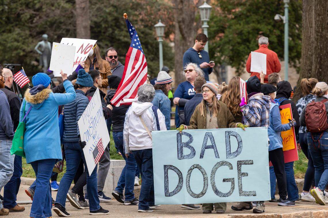 Hundreds of demonstrators march around the perimeter of the North Carolina State Capitol in Raleigh on Wednesday, Feb. 5, 2024, to protest the Trump administration. The protest was one of 50 planned in state capitals nationwide on Wednesday.