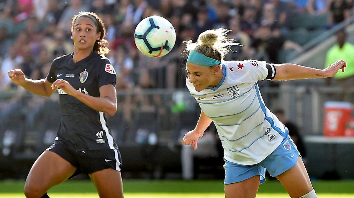 Chicago Red Stars’ Julie Ertz (8) makes the header against NC Courage’s Lynn Williams (9). The North Carolina Courage and the Chicago Red Stars met in the 2019 National Women’s Soccer League Championship Finals in WakeMed Soccer Park in Cary, N.C. on October 27, 2019. Courage wins 4-0.