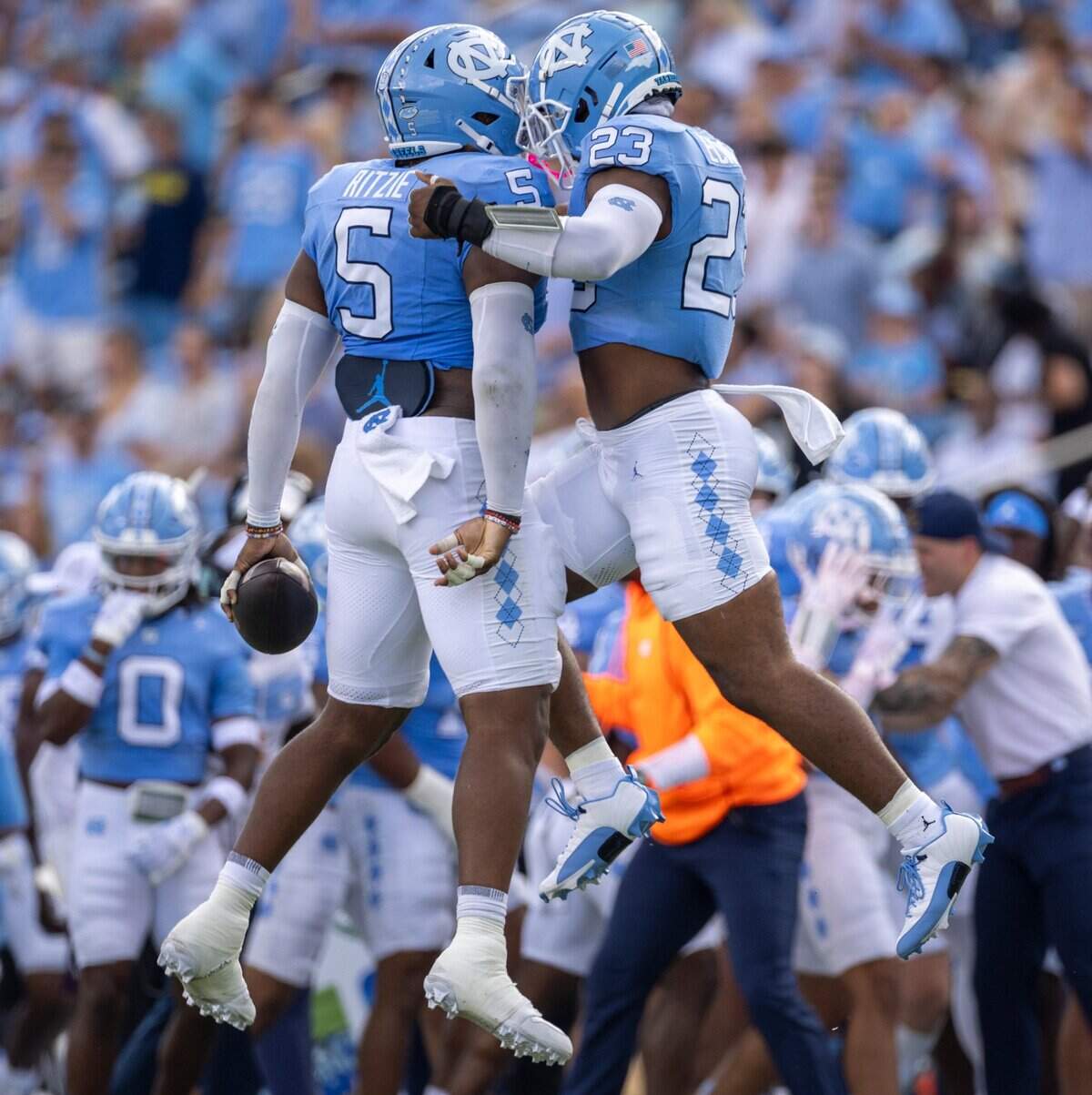 North Carolina defensive lineman Jahvaree Ritzie (5) celebrates a defensive stop with linebacker Powers Echols (23) in the first quarter against Charlotte on Saturday, September 7, 2024 at Kenan Stadium in Chapel Hill, N.C.