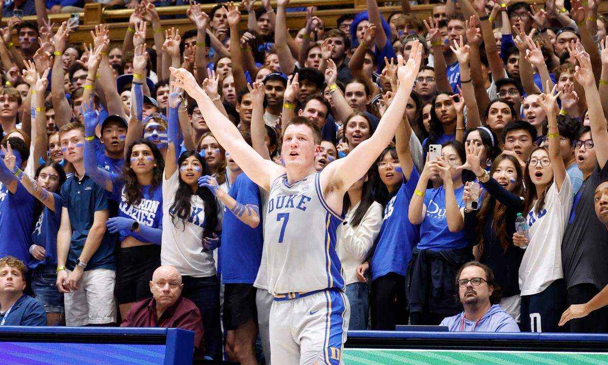 Duke’s Kon Knueppel (7) watches his three-pointer go in during the first half of Duke’s game against Army at Cameron Indoor Stadium in Durham, N.C., Friday, Nov. 8, 2024.