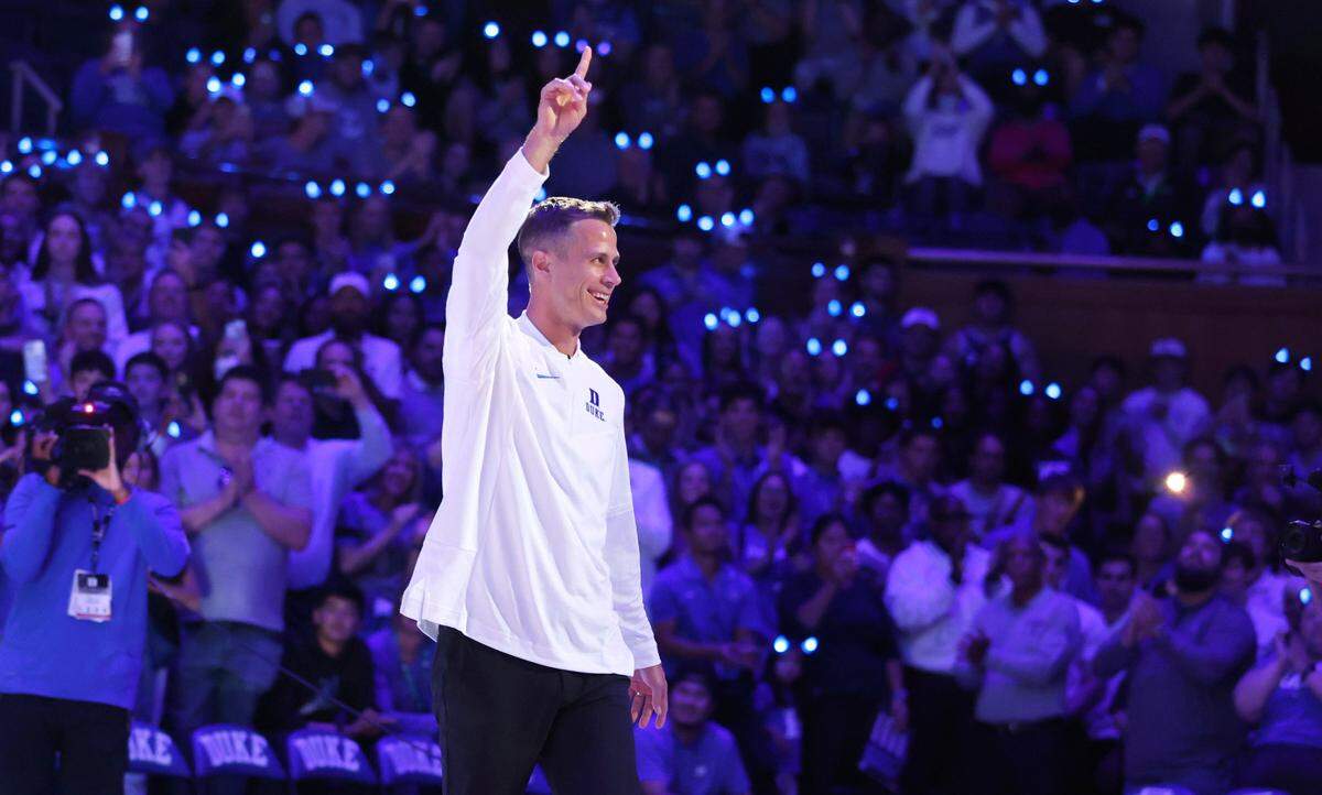 Duke’s head coach Jon Scheyer acknowledges the crowd after being introduced during Duke’s Countdown to Craziness at Cameron Indoor Stadium in Durham, N.C., Friday, Oct. 21, 2022.