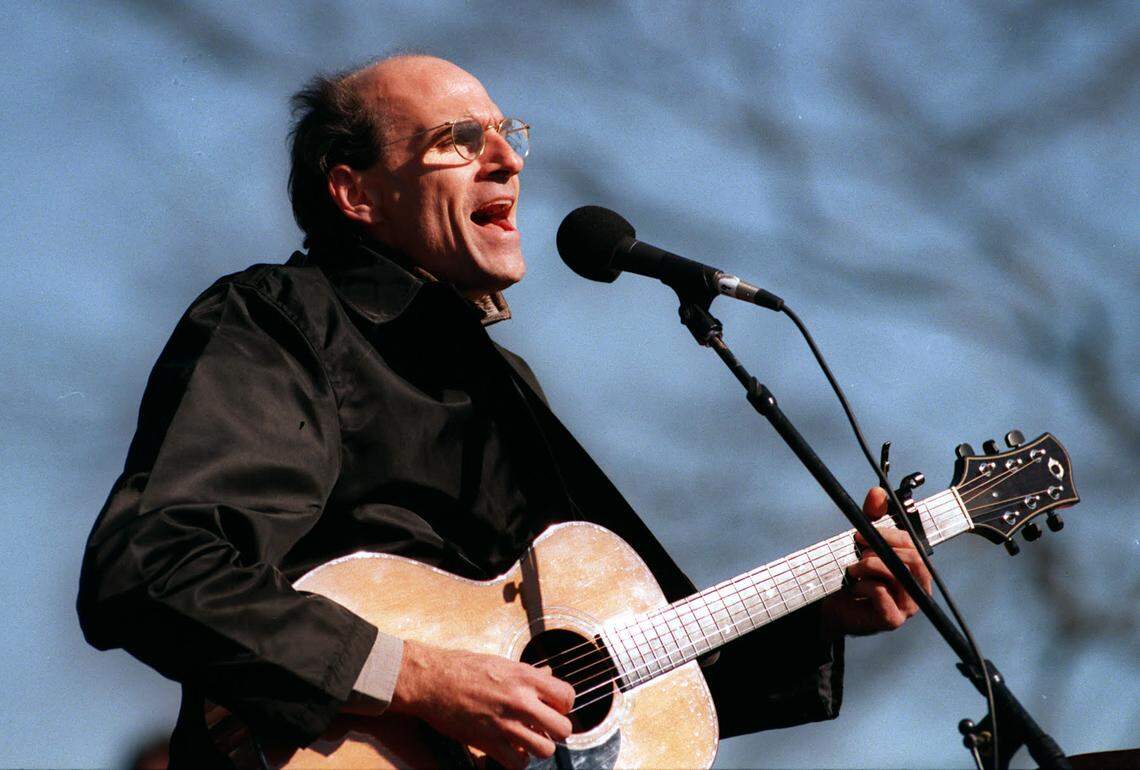 North Carolina native James Taylor performs in Raleigh in the 1990’s. He’s still touring, playing favorites like “Carolina In My Mind”.