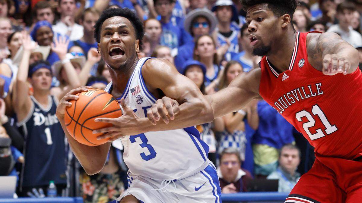 Duke’s Jeremy Roach (3) is fouled by Louisville’s Sydney Curry (21) during the second first half of Duke’s 79-62 victory over Louisville at Cameron Indoor Stadium in Durham, N.C., Monday, Feb. 20, 2023.