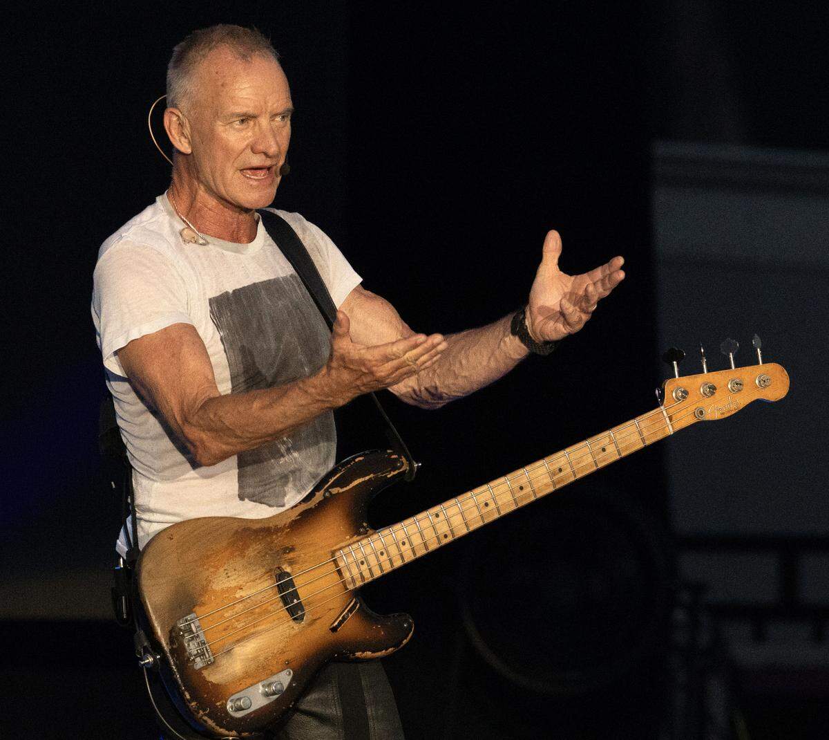 Sting seemingly pulls the words to “Message in a Bottle” from the crowd as they sing along.