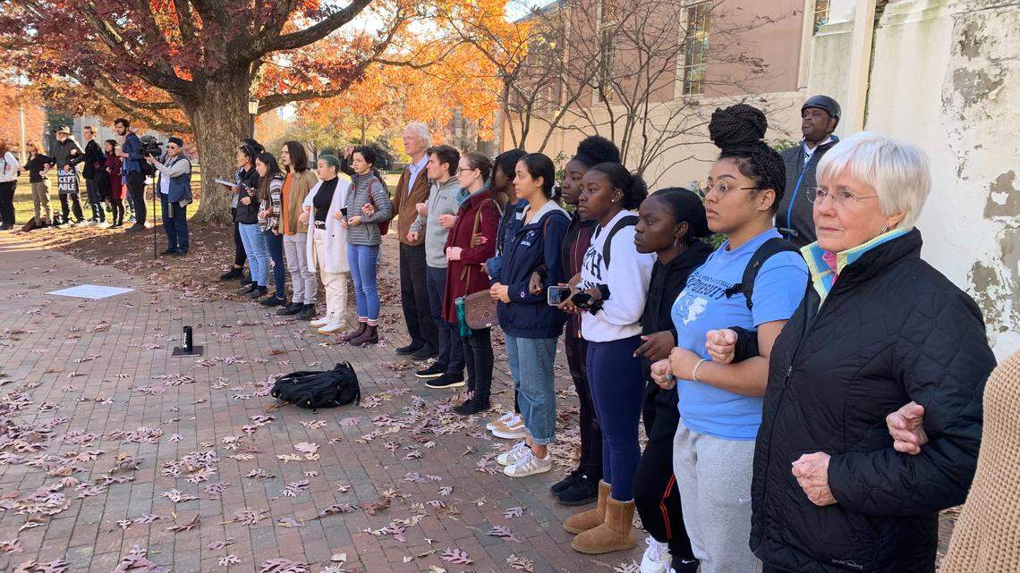 Protesters march through UNC, criticizing Silent Sam deal and money to Confederate group
