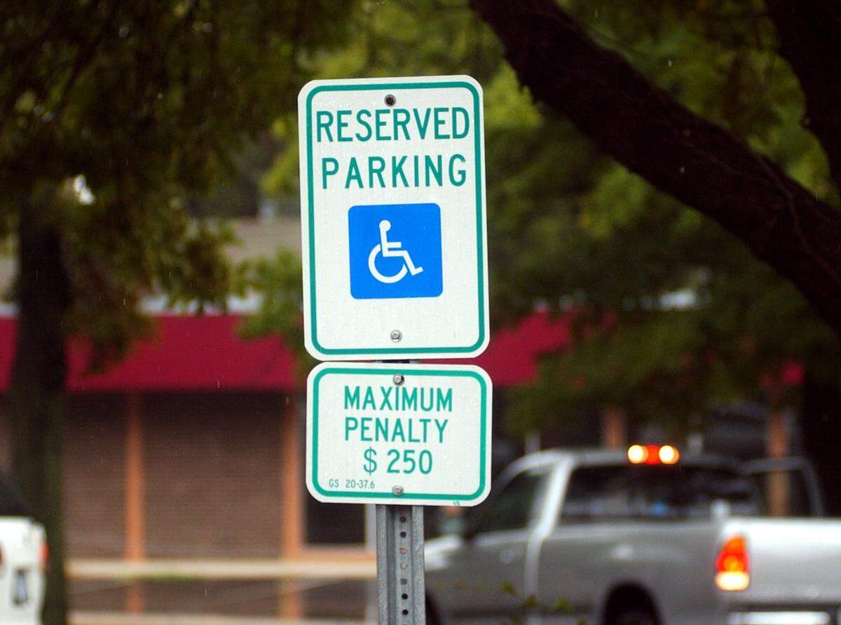 Accessible parking sign in Chapel Hill.