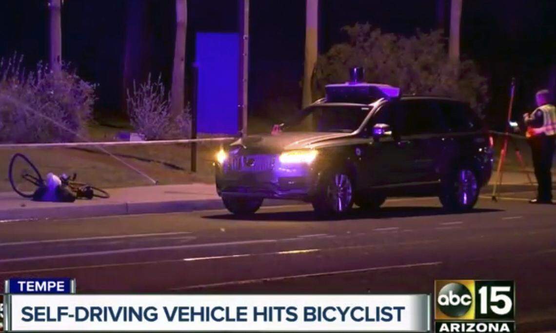 Still image taken from video provided by ABC-15, shows investigators at the scene of a fatal accident involving a self driving Uber car on the street in Tempe, Ariz. Police in the city of Tempe said Monday, March 19, 2018, that the vehicle was in autonomous mode with an operator behind the wheel when the woman walking outside of a crosswalk was hit.