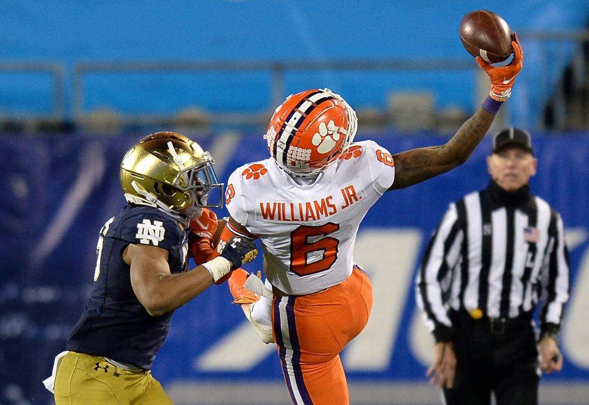 Clemson Tigers wide receiver E.J. Williams makes a one-handed catch from quarterback Trevor Lawrence during third quarter action of the ACC Championship game. Clemson defeated Notre Dame 34-10 to win the championship at Bank of America Stadium in Charlotte, NC on Saturday, December 19, 2020.  
