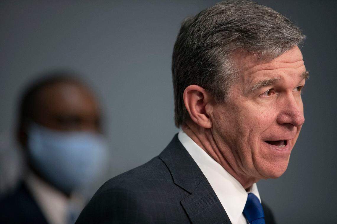 North Carolina Governor Roy Cooper speaks during a press briefing on the COVID-19 virus and vaccination efforts on Tuesday, February 9, 2021 at the Emergency Operations Center in Raleigh, N.C.