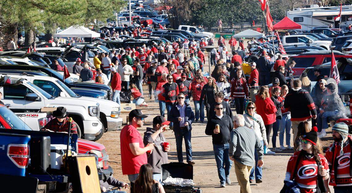 Fans tailgate before the NHL Stadium Series game between the Carolina Hurricanes and the Washington Capitals at Carter-Finley Stadium in Raleigh, N.C., Saturday, Feb. 18, 2023.
