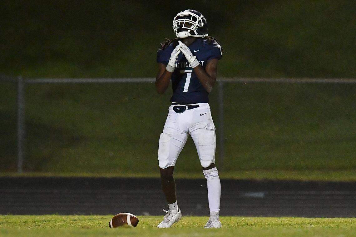 Southeast Raleigh wide receiver Tyrus Whyte (7) reacts to missing the touchdown catch against Cardinal Gibbons during the second half. The Southeast Raleigh Bulldogs and the Cardinal Gibbons Crusaders met in a non-conference football game in Raleigh, N.C. September 12, 2025