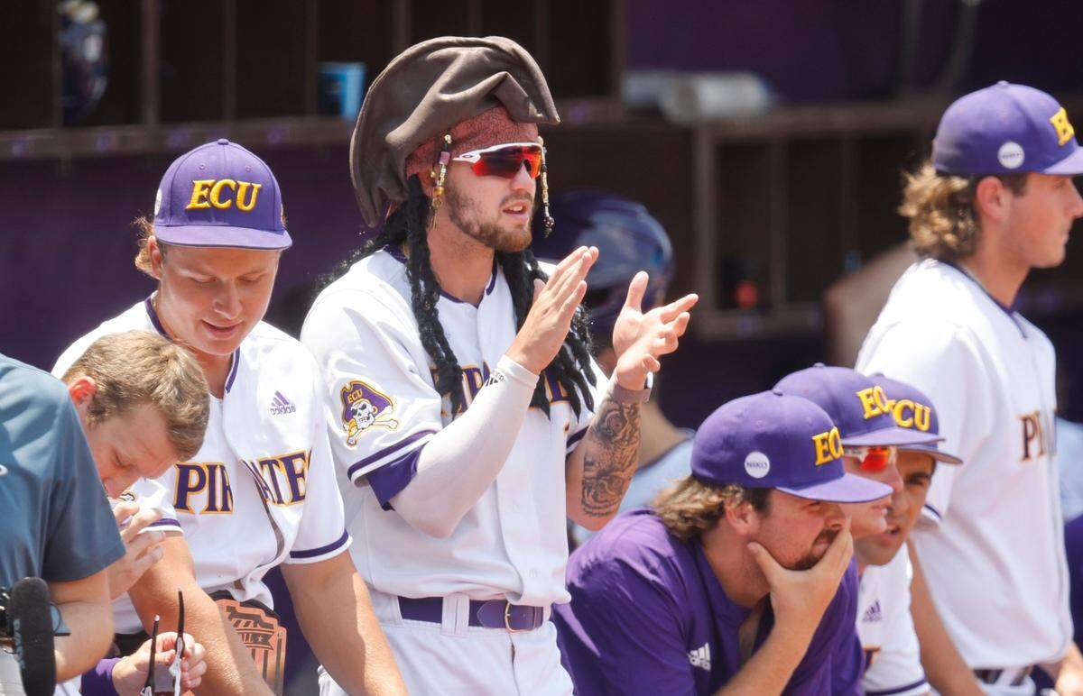 East Carolina’s Ryder Giles (3) cheers on the team during ECUs game against Texas in the Greenville Super Regional at Clark-LeClair Stadium Friday, June 10, 2022.