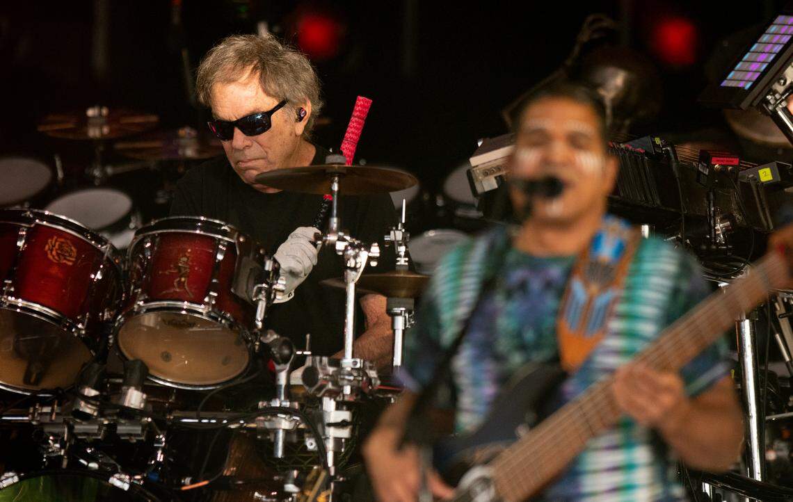 Drummer Mickey Hart lays down a beat with bassist Oteil Burbridge at front as Dead & Company perform on their final tour at Raleigh, N.C.’s Coastal Credit Union Music Park at Walnut Creek, Thursday night, June 1, 2023.
