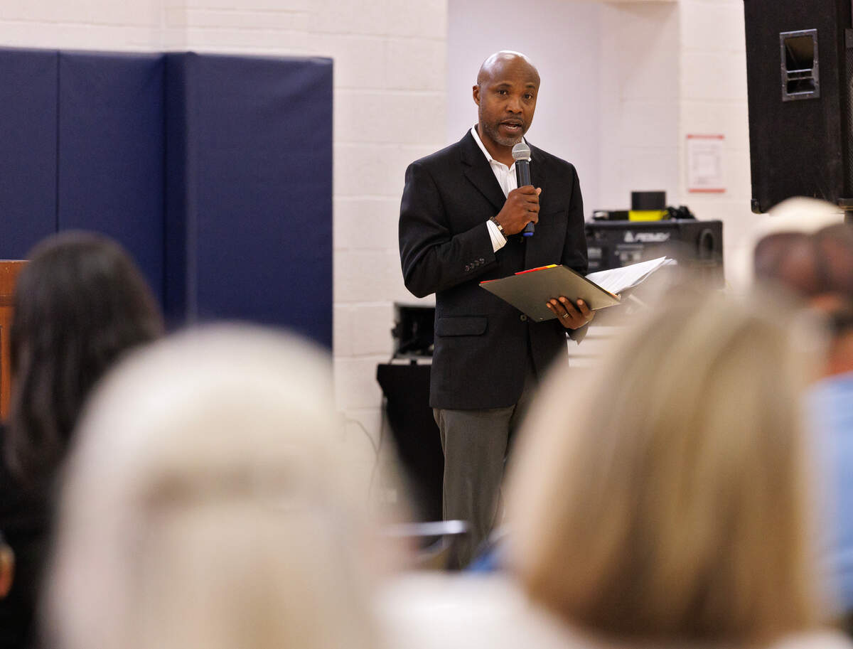 Taiwo Jaiyeoba, Zebulon interim town manager, speaks during a town hall meeting on Monday, April 28, 2025, at Zebulon Community Center.
