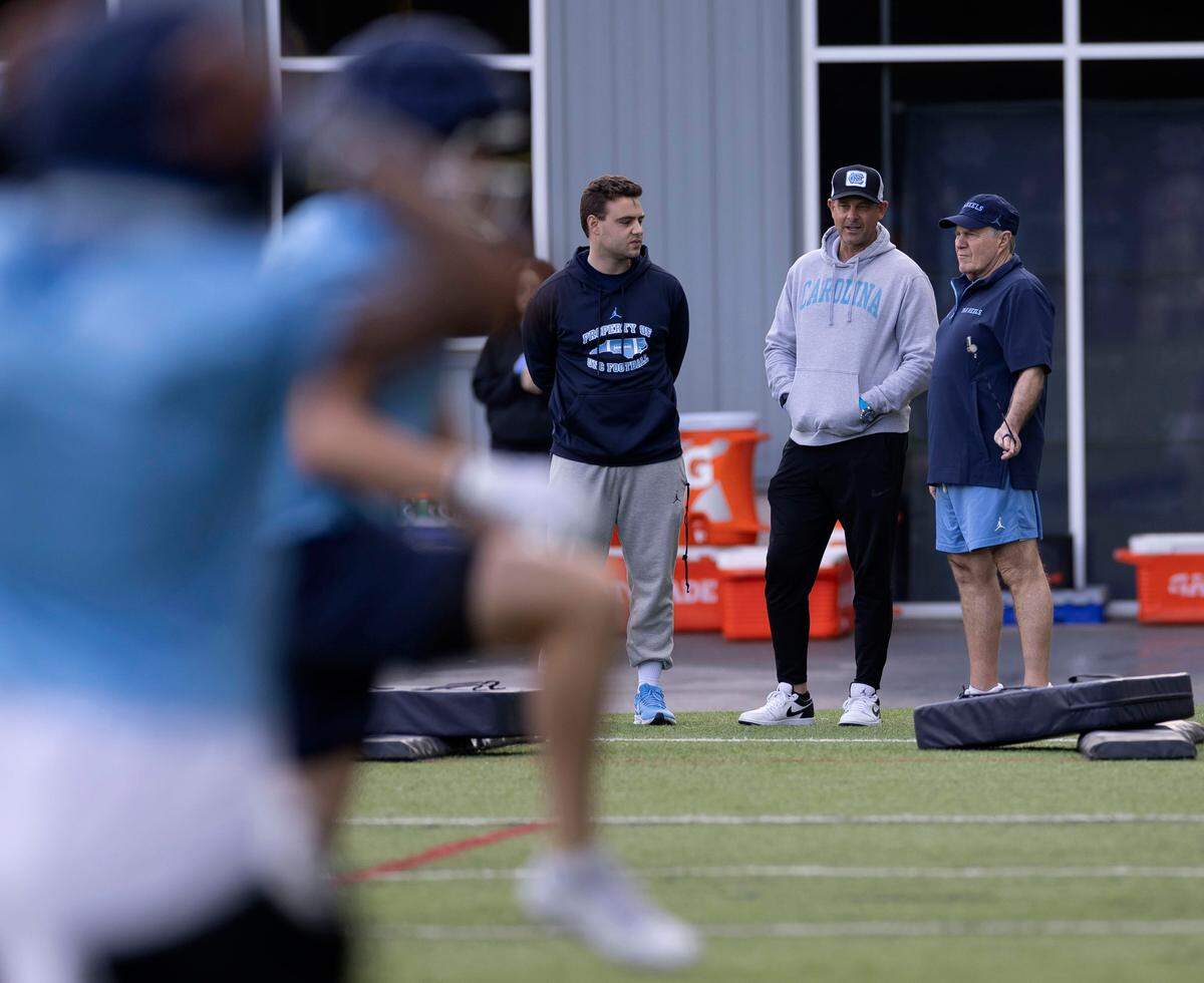 North Carolina coach Bill Belichick twirls his whistle as he watches his players stretch during the Tar Heels’ Spring practice on Wednesday, March 5, 2025 in Chapel Hill N.C.