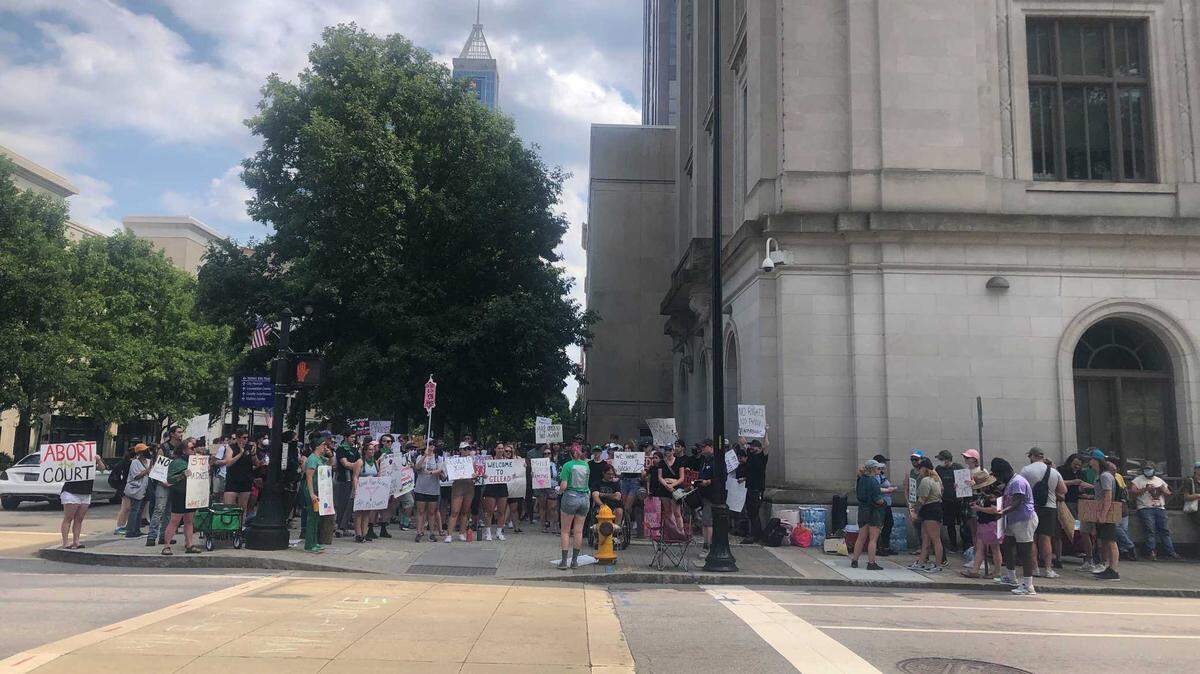 People gathered at the state Capitol in downtown Raleigh Monday afternoon, Jule 4, 2022, to protest the Supreme Court’s recent decision to overturn Roe v. Wade.