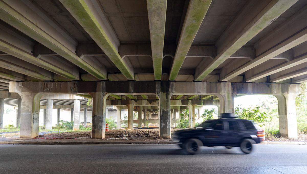 Traffic on Beryl Road crosses beneath the I-440/Beltline Bridge that will be demolished over the weekend.