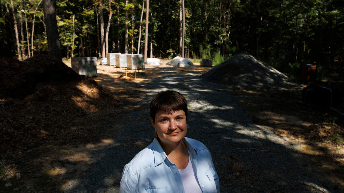 Second Act Farms co-owner Mandy Locke, photographed on Tuesday, Sept. 10, 2024, is partnering with the North Carolina Center on Actual Innocence to build two homes at the Alamance County farm that will help support exonerees as they re-integrate into society.