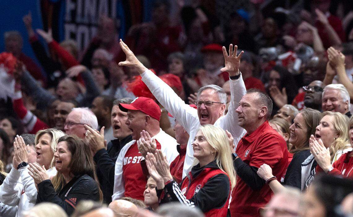 N.C. State fans cheer during the first half of the Wolfpack’s Final Four game to South Carolina at Rocket Mortgage FieldHouse on Friday, April 5, 2024, in Cleveland, Ohio.