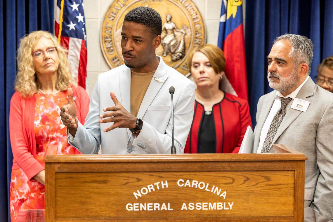 Wake County Board of Education members Tyler Swanson, left, and vice-chair Chris Heagarty speak during a press conference at the State Legislative Building on Monday, Aug 14, 2023. House Democrats, joined by school board members and parents, held news conferences across the state Monday to raise concerns about the lack of a state budget and GOP budget plans.