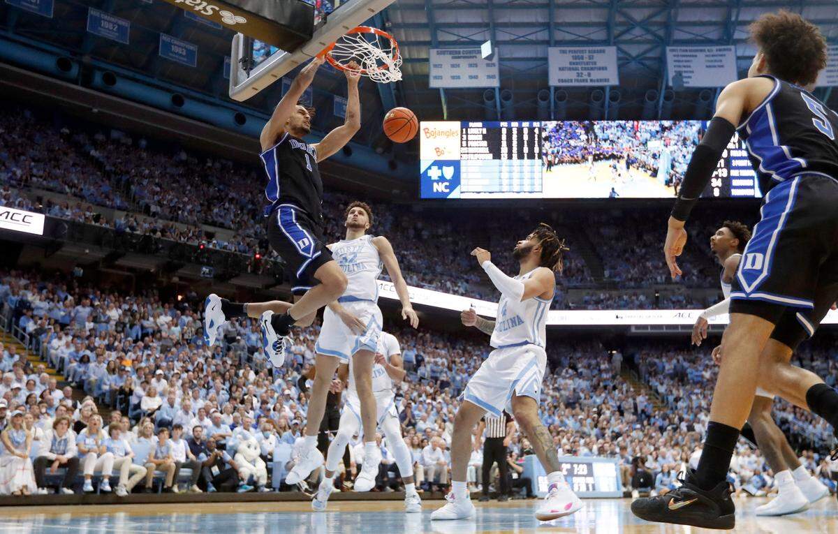 Duke’s Dereck Lively II (1) slams in two during Duke’s 62-57 victory over UNC at the Smith Center in Chapel Hill, N.C., Saturday, March 4, 2023.