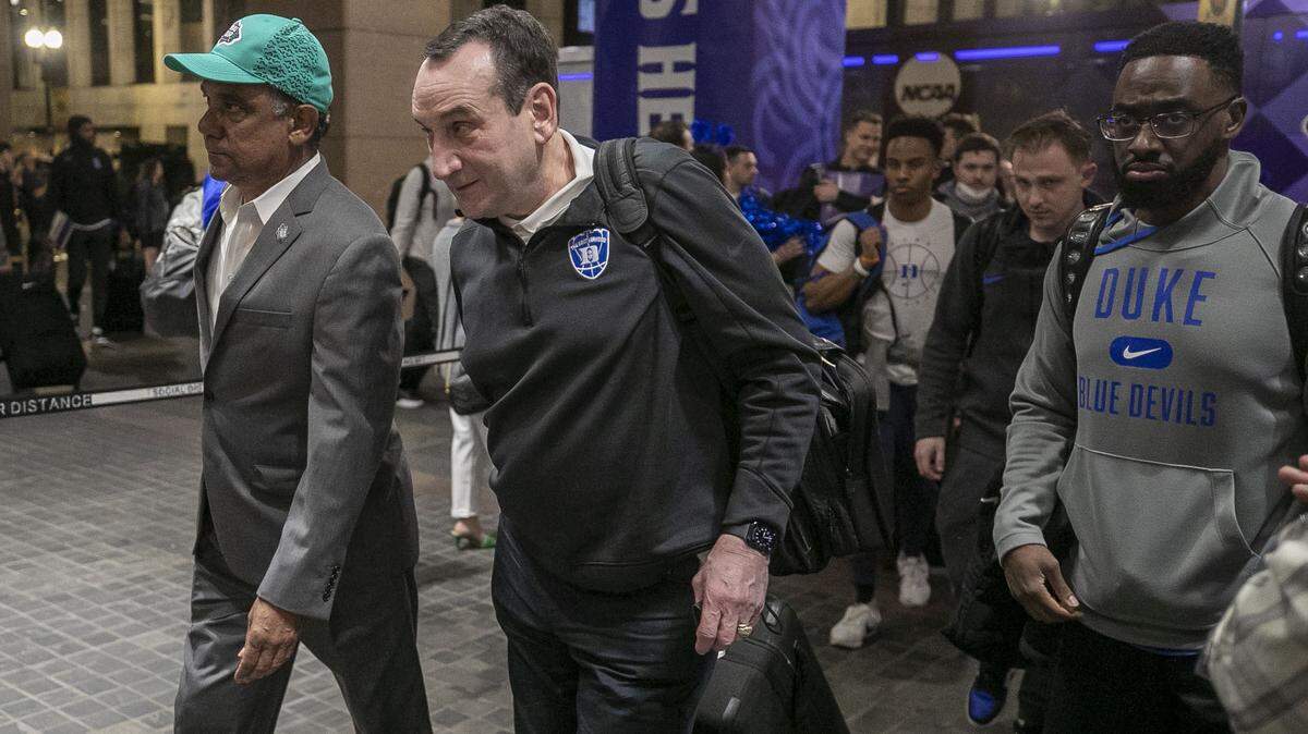 Duke coach Mike Krzyzewski leads the Blue Devils’ into the team hotel, The InterContinental, for the NCAA Final Four on Tuesday, March 29, 2022 in New Orleans, La.