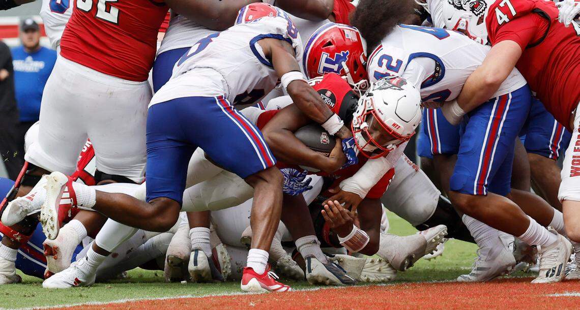 N.C. State quarterback CJ Bailey (16) dives in to score a touchdown during the second half of N.C. State’s 30-20 victory over LA Tech at Carter-Finley Stadium in Raleigh, N.C., Saturday, Sept. 14, 2024.