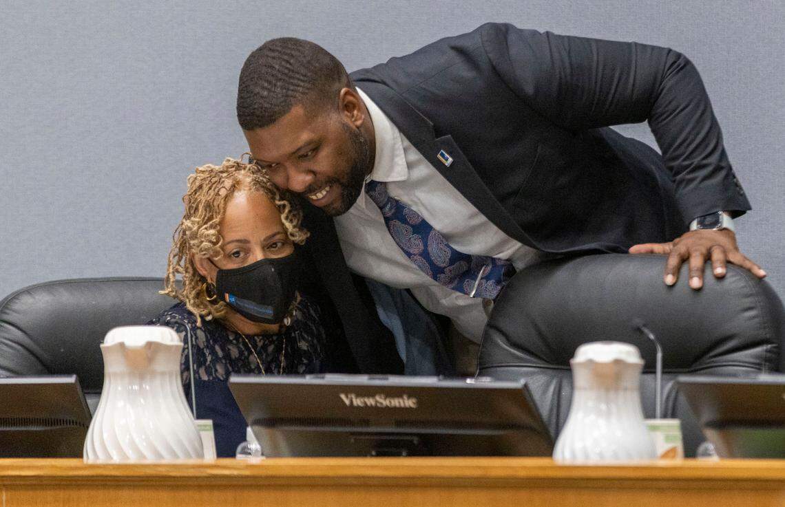 Durham council member Leonardo Williams embraces Durham Mayor Elaine O’Neal prior to their meeting on Monday, April 18, 2022 at City Hall in Durham, N.C.