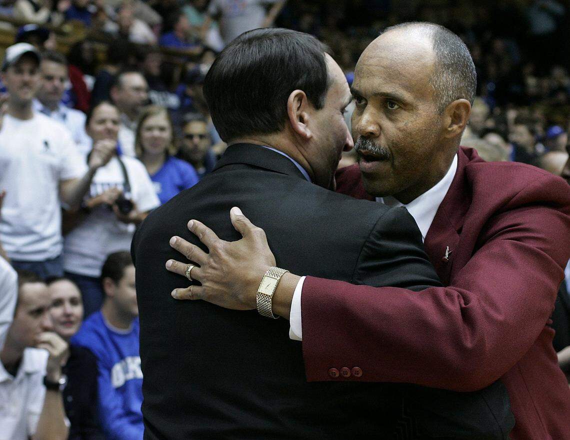 NCCU coach Henry Dickerson, right, is greeted by Duke coach Mike Krzyzewski at Cameron Indoor Stadium on Friday, Nov. 9, 2007, for the Eagles’ first regular season game as a Division I team. Duke won 121-56.