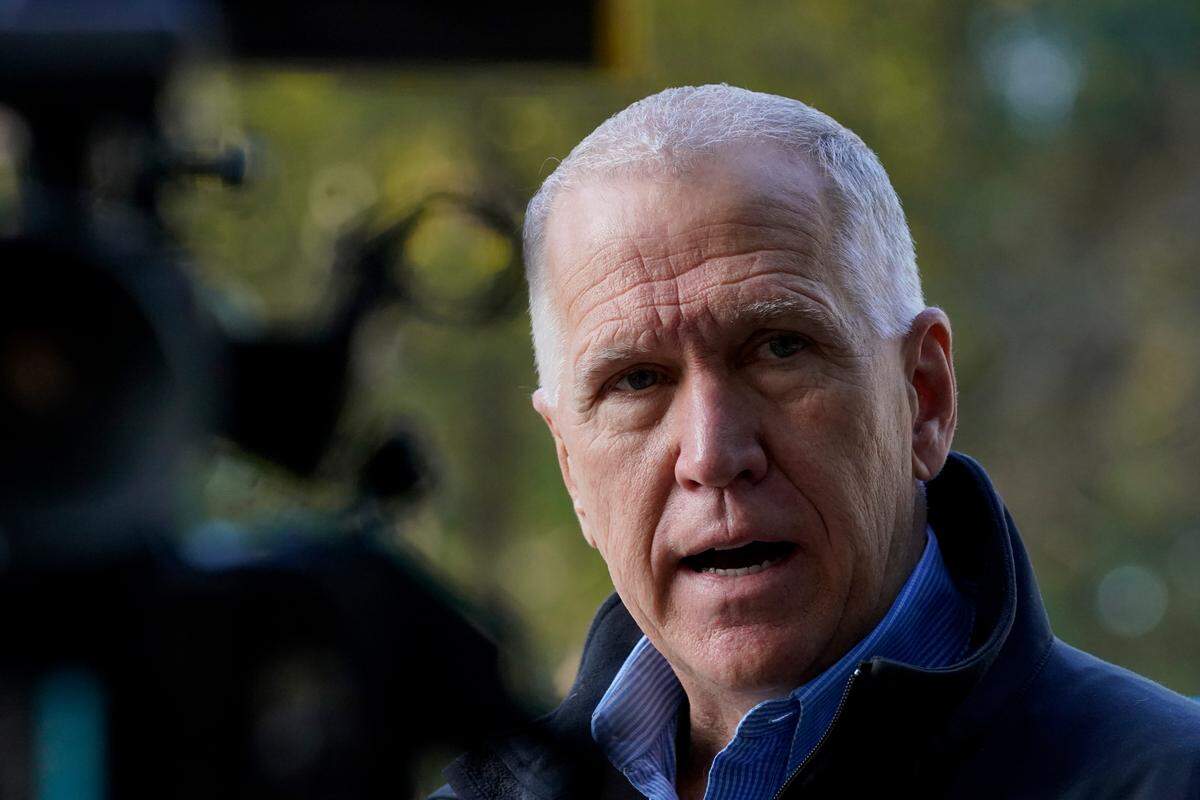 U.S. Sen. Thom Tillis, R-N.C., speaks to reporters during a visit to a poll location in Jetton Park Tuesday, Nov. 3, 2020, in Cornelius, N.C.