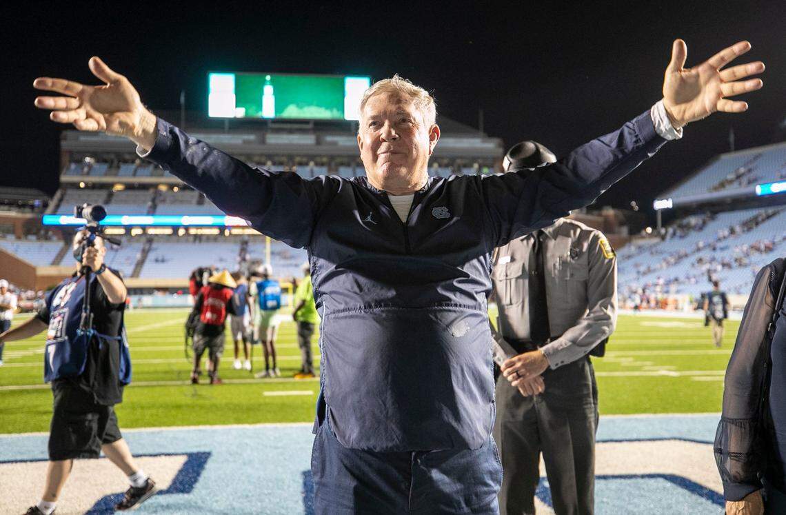 North Carolina coach Mack Brown celebrates the Tar Heels’ 59-39 victory over Virginia with the student section on Saturday, September 18, 2021 at Kenan Stadium in Chapel Hill, N.C.