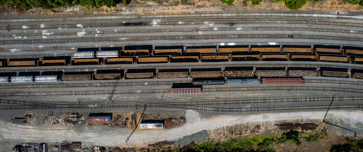 Hoppers and boxcars sit on the tracks in the Norfolk Southern rail yard near downtown Raleigh Wednesday, Sept. 14, 2022. A labor dispute between the nationís freight railroads and two unions representing many of their employees could bring passenger trains to a halt in North Carolina.