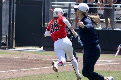 Arizona outfielder Regan Shockey runs toward home plate during the NCAA Tournament regional game against Duke at Smith Family Stadium in Durham, North Carolina, on May 16, 2026.