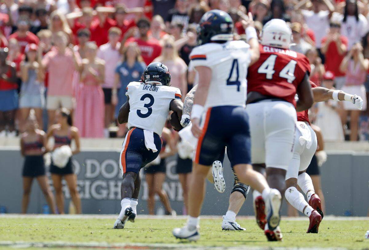 On fourth and one, Virginia running back J'Mari Taylor (3) breaks free to score on a 39-yard touchdown run during the first half of N.C. State’s game against Virginia at Carter-Finley Stadium in Raleigh, N.C., Sat. Sept. 6, 2025.