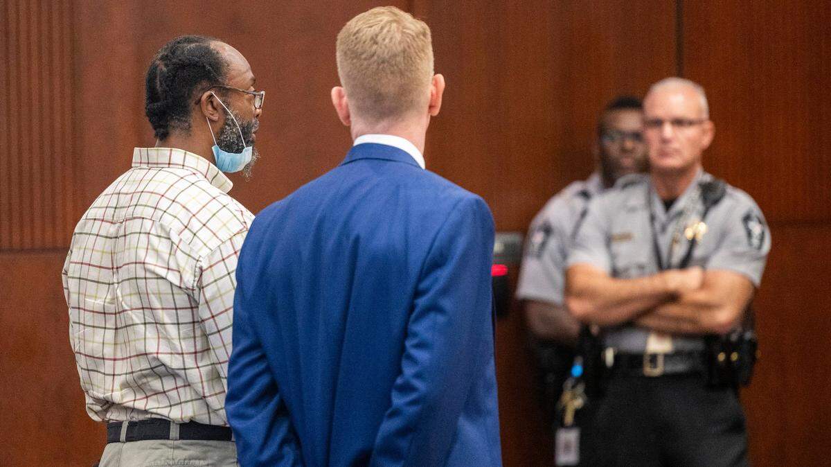 Omar Abdullah, left, a former RPD detective charged with obstruction of justice after working with the confidential informant that sold fake drugs, stands with his attorney Ryan Ellis Wednesday, Oct. 4, 2023 at the Wake County Justice Center. Superior Court Judge Pat Nadolski sentenced Abdullah to 38 days in jail, followed by 24 months of supervised probation after he pleaded guilty.