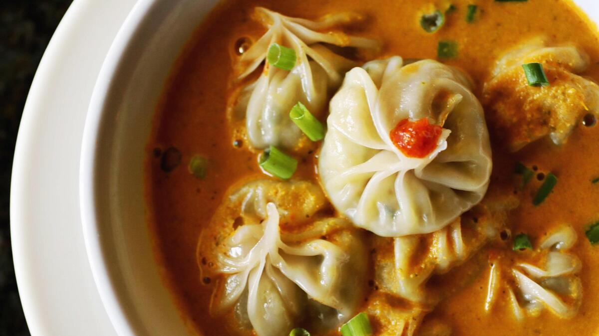 Kathmandu Kitchen offers made-to-order momo such as the johl momo, which serves up the dumplings in a fragrant, turmeric-and-tomato tinged broth.