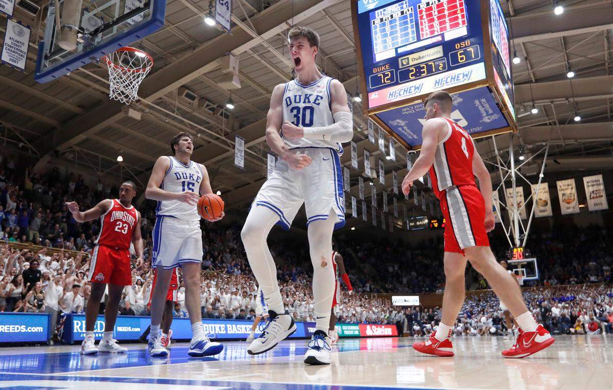 Duke’s Kyle Filipowski (30) celebrates after making the basket while being fouled in the second of Duke’s 81-72 victory over Ohio State at Cameron Indoor Stadium in Durham, N.C., Wednesday, Nov. 30, 2022.