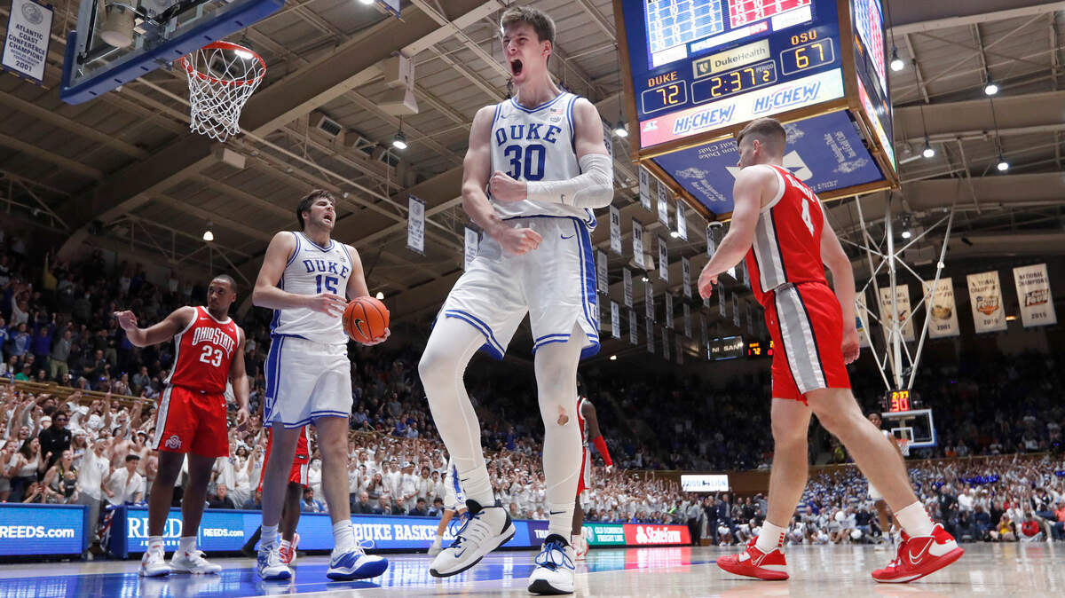 Duke’s Kyle Filipowski (30) celebrates after making the basket while being fouled in the second of Duke’s 81-72 victory over Ohio State at Cameron Indoor Stadium in Durham, N.C., Wednesday, Nov. 30, 2022.