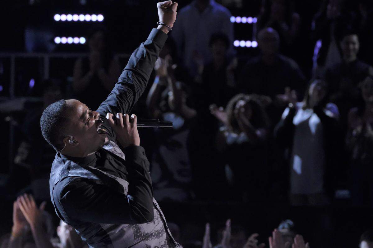 Rayshun LaMarr sings as a Top 12 contestant on NBC's "The Voice" on April 23, 2018.