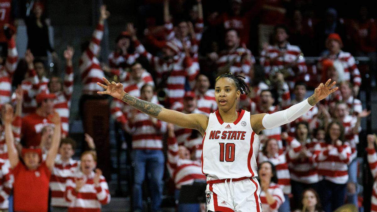 N.C. State’s Aziaha James reacts after making a three-point basket during overtime of the Wolfpack’s 88-80 win over Florida State on Thursday, Jan. 4, 2023, at Reynolds Coliseum in Raleigh, N.C.