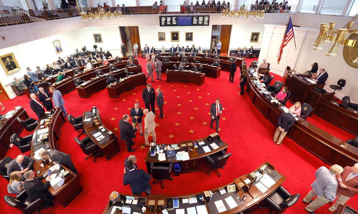 Senators mingle before the N.C. Senate’s session at the N.C. Legislative Building in Raleigh, N.C., Tuesday, June 20, 2023.