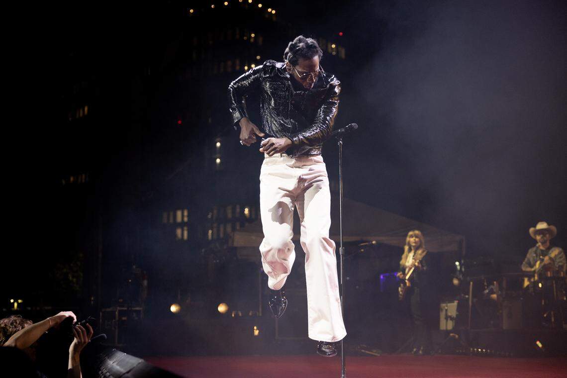 Leon Bridges dances across the stage at Red Hat Amphitheater in Raleigh, N.C., Friday night, Sept. 12, 2025.