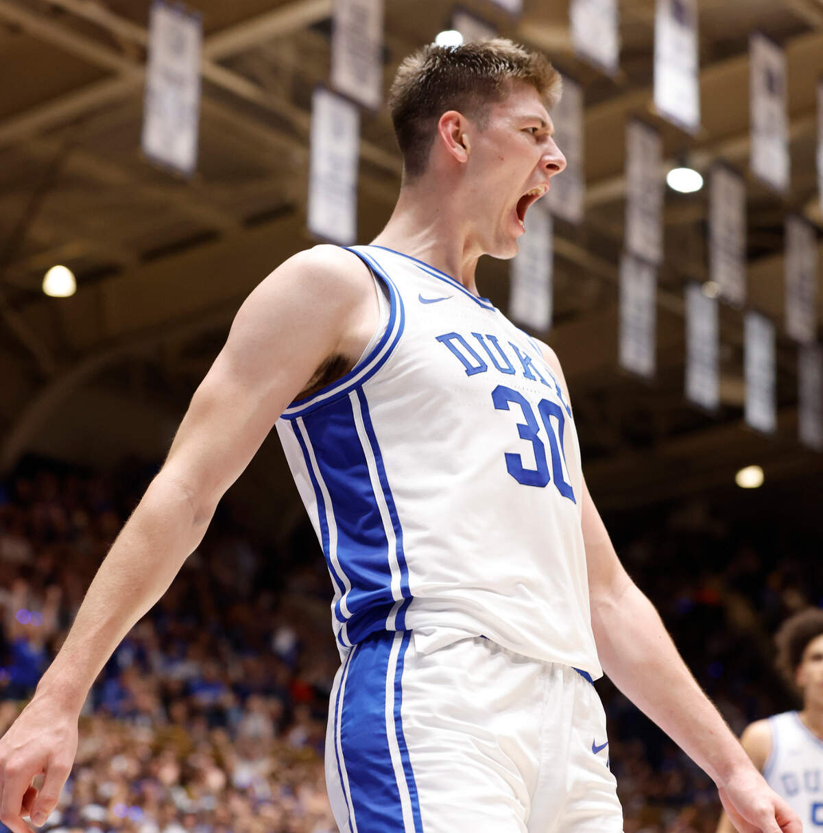 Duke’s Kyle Filipowski (30) celebrates after slamming in two during the second half of Duke’s 84-38 victory over USC Upstate at Cameron Indoor Stadium in Durham, N.C., Friday, Nov. 11, 2022.