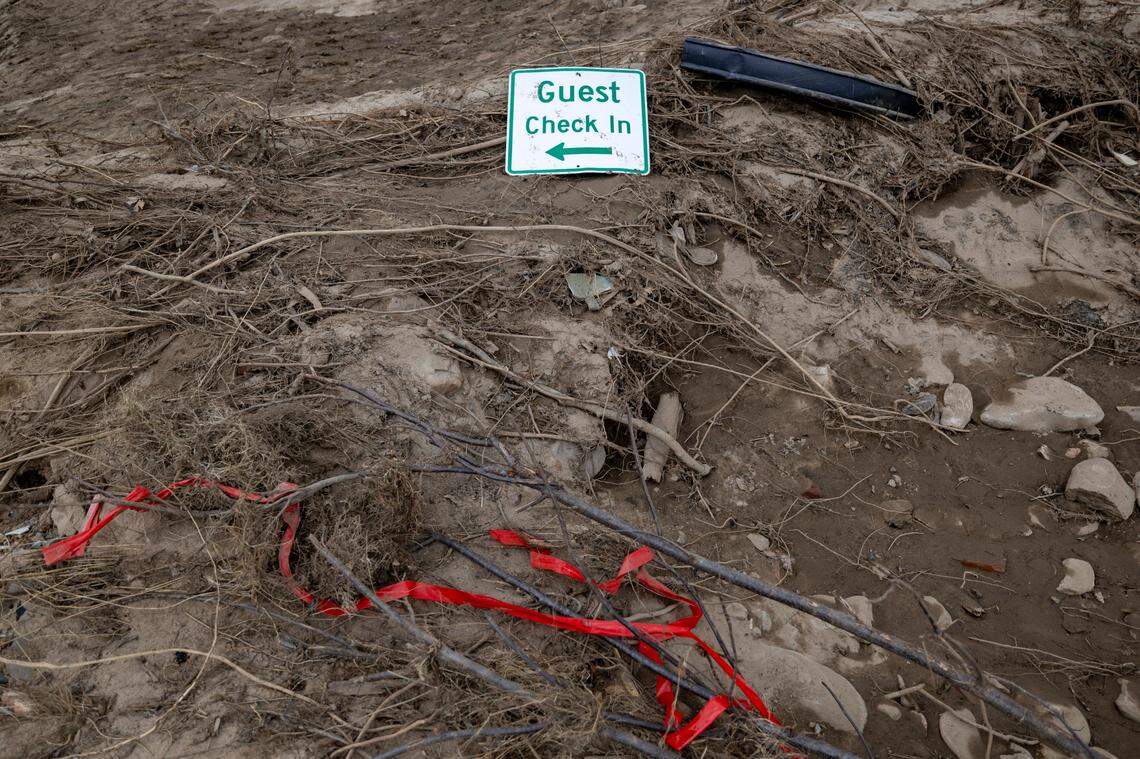 The guest check in sign at the Hot Springs Resort And Spa on Friday, October 4, 2024 after Spring Creek and the French Board River flooded the resort in the wake of Hurricane Helene.