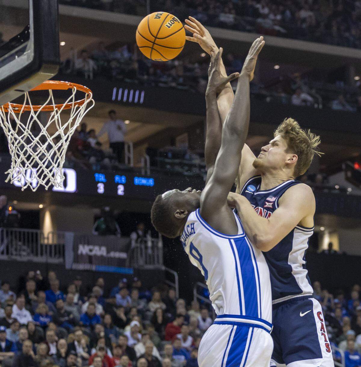 Arizona center Henri Veesaar (13) puts up a shot against Duke center Khaman Maluach defends in the second half on Thursday, March 27, 2025 during the NCAA Sweet 16 at Prudential Center in Newark, NJ. 