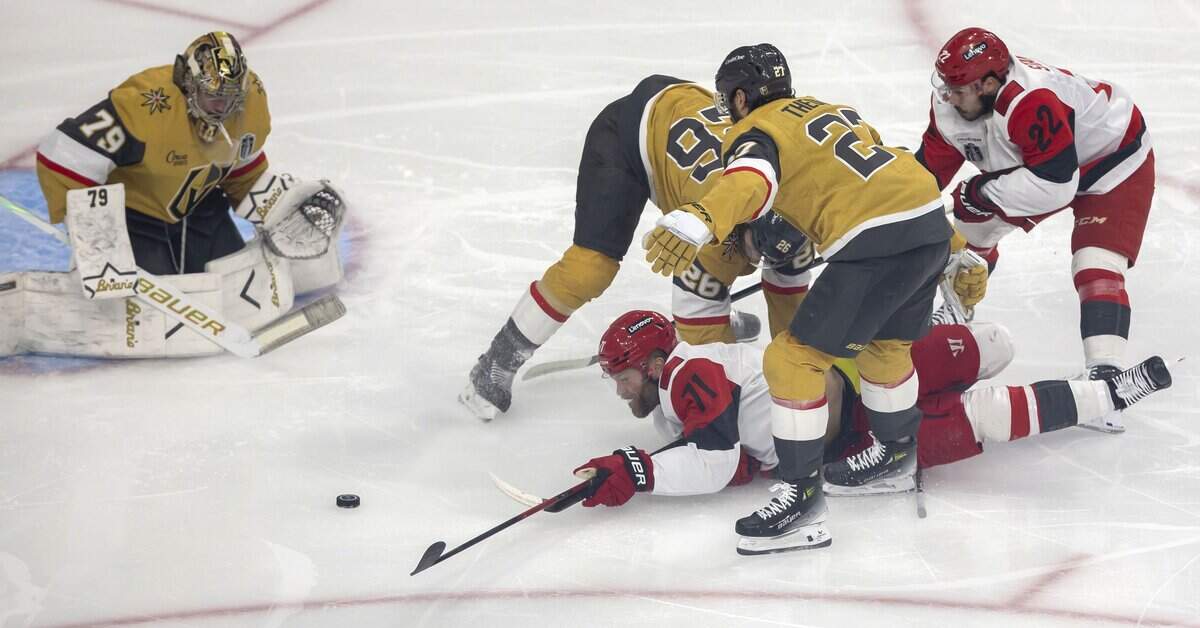 Carolina Hurricanes left wing Taylor Hall (71) is tripped by Vegas defenseman Shea Theodore (27) in the first period of Game 4 of the Stanley Cup Final, on Tuesday, June 9, 2026 in Las Vegas, NV.